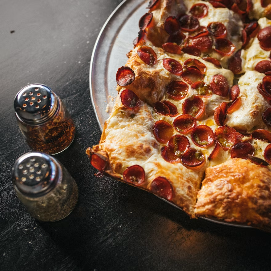 A square, tavern pepperoni pizza.