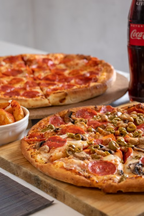close-up of pizzas at a party