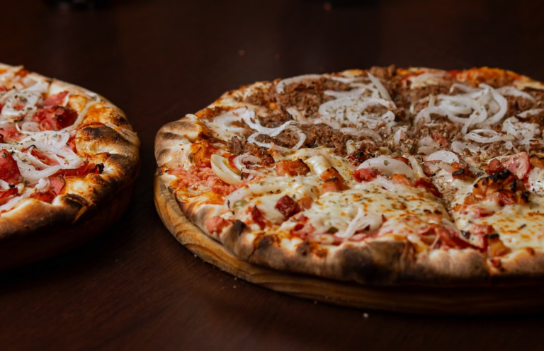 This photo shows a pizza with different toppings on it.
