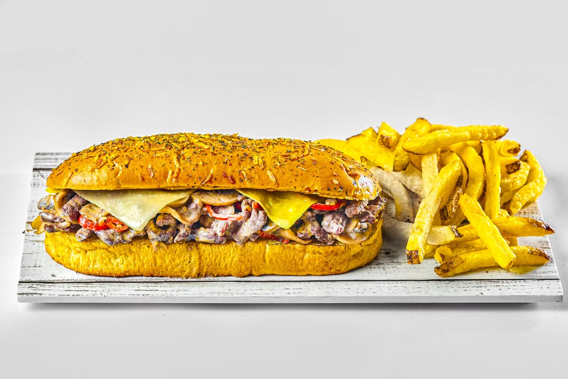This photo shows a cheesesteak sandwich.